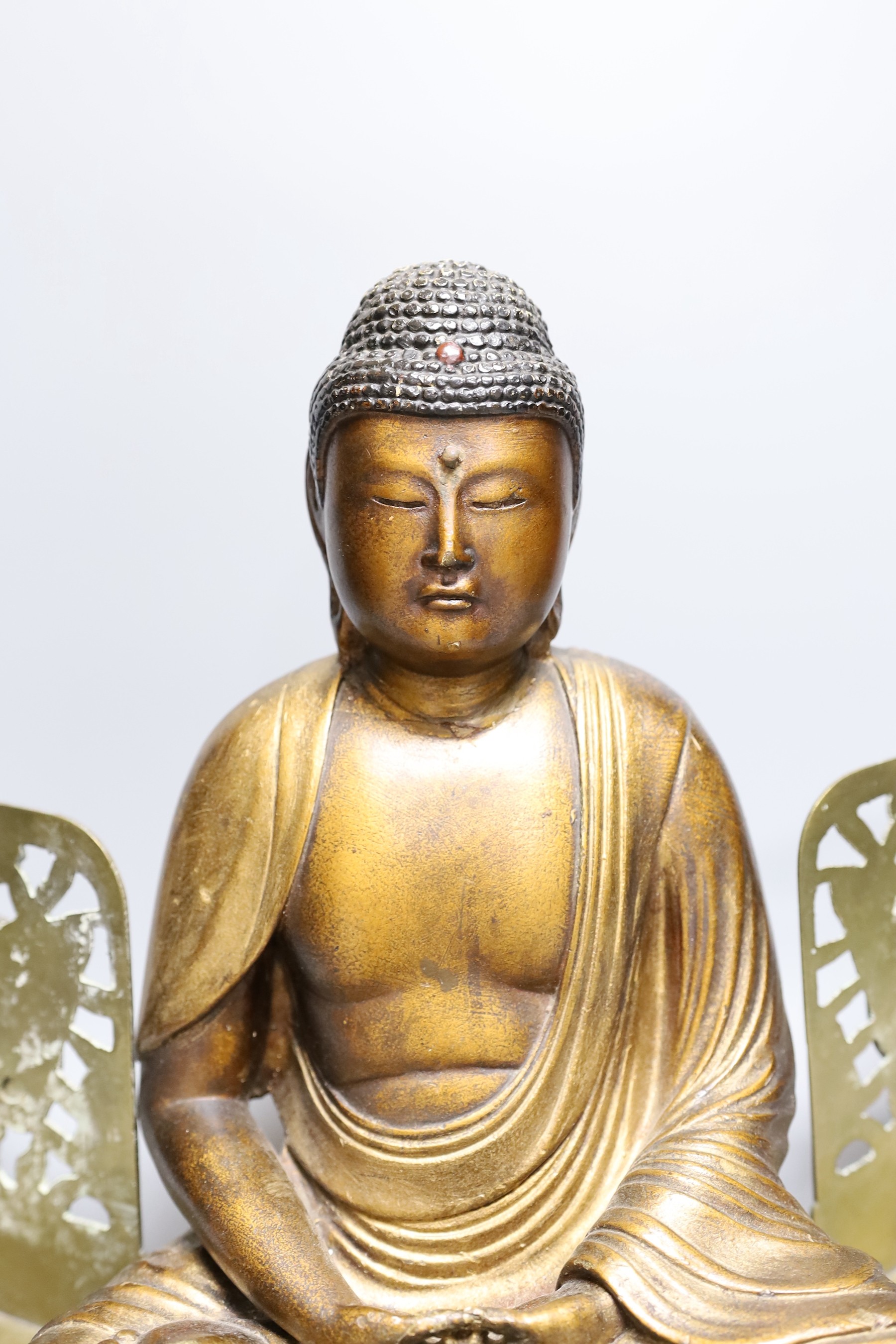 Assorted Chinese items, to include a bronze tripod censer, an enamel dragon cover, a lacquered seated Buddha, 34cm tall, and book ends (5)